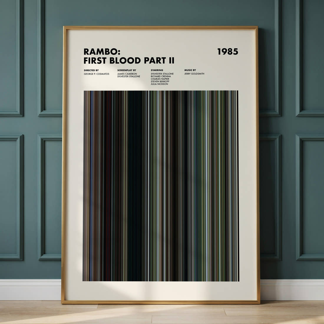 Rambo: First Blood Part II Movie Barcode Poster framed and leaning against a panelled wall