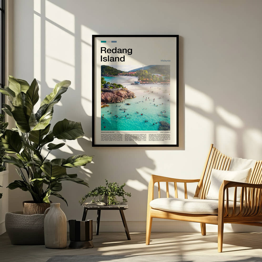 Redang Swimmers In Turquoise Water Travel Print framed on a pale wall beside houseplants