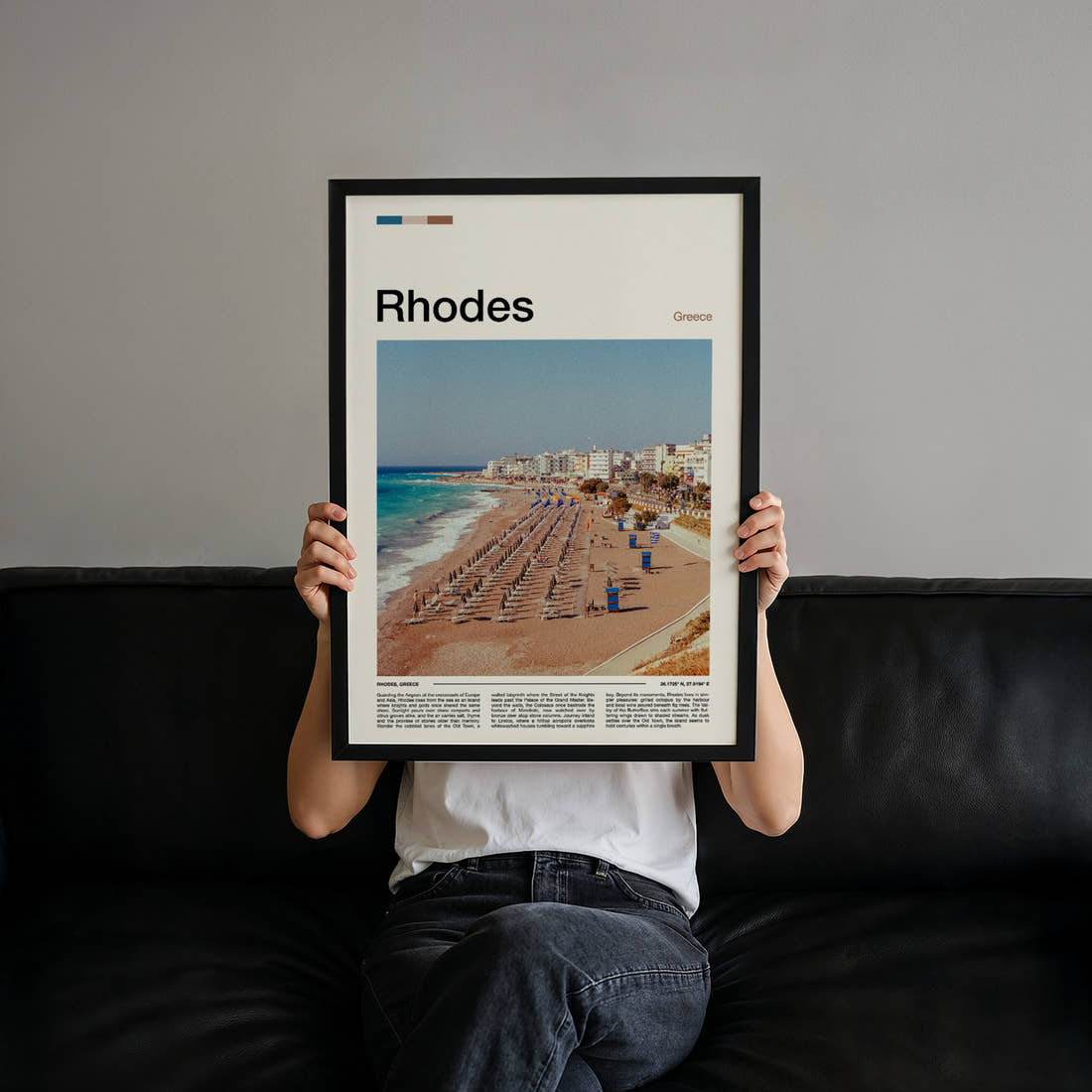 Rhodes Aerial Beach View Travel Print held up by hand to show the size of the print