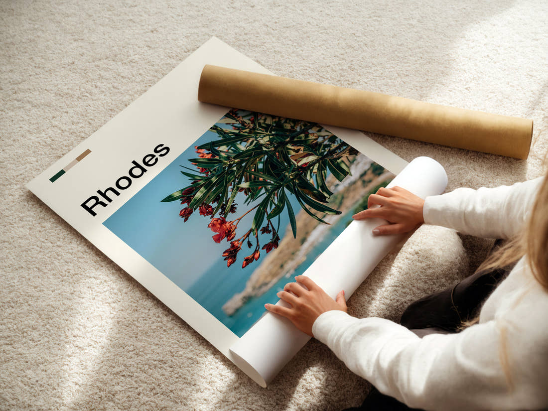 Rhodes Oleander Over Bay Travel Print being unrolled from its postal tube