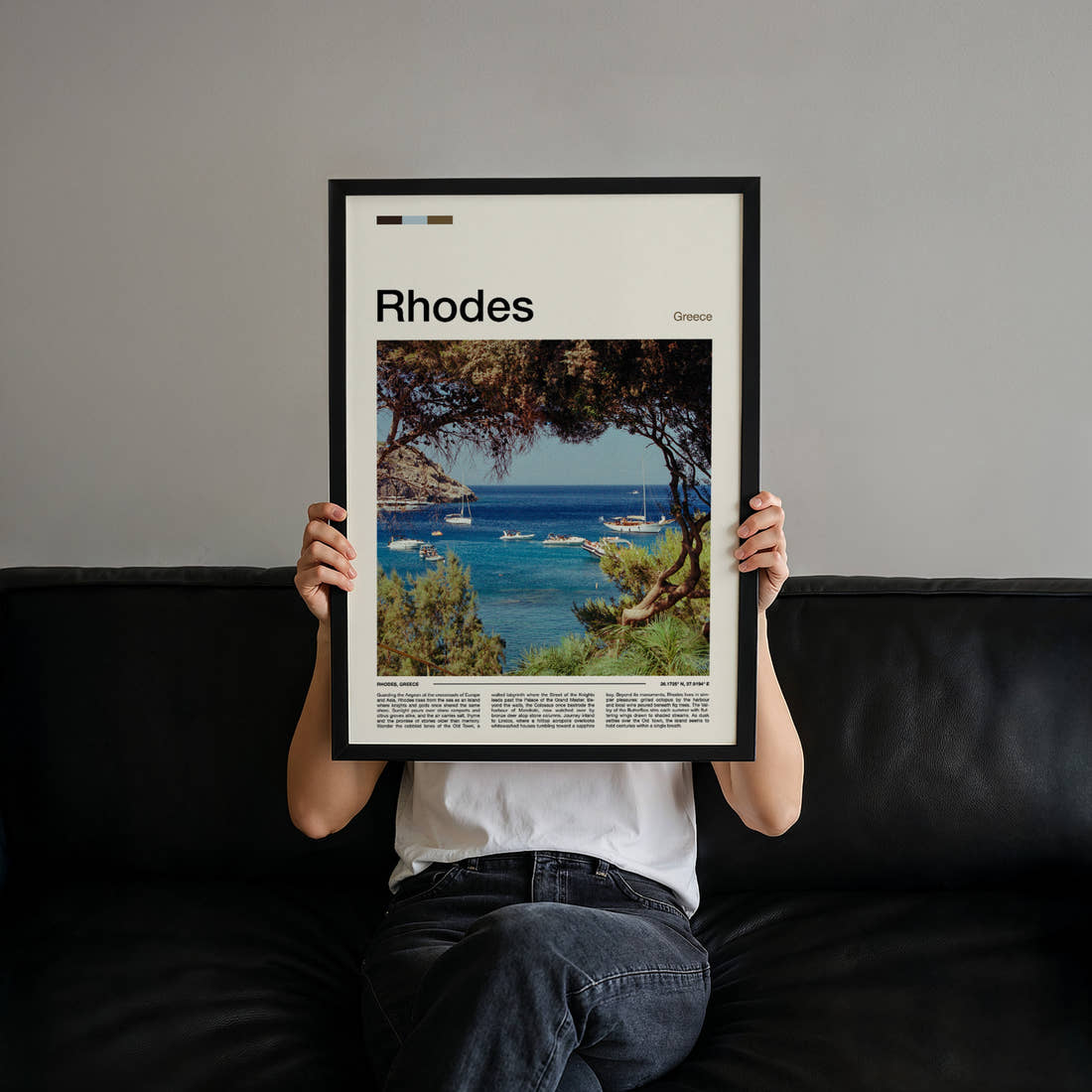 Rhodes Pine-Framed Harbour Bay Travel Print held up by hand to show the size of the print