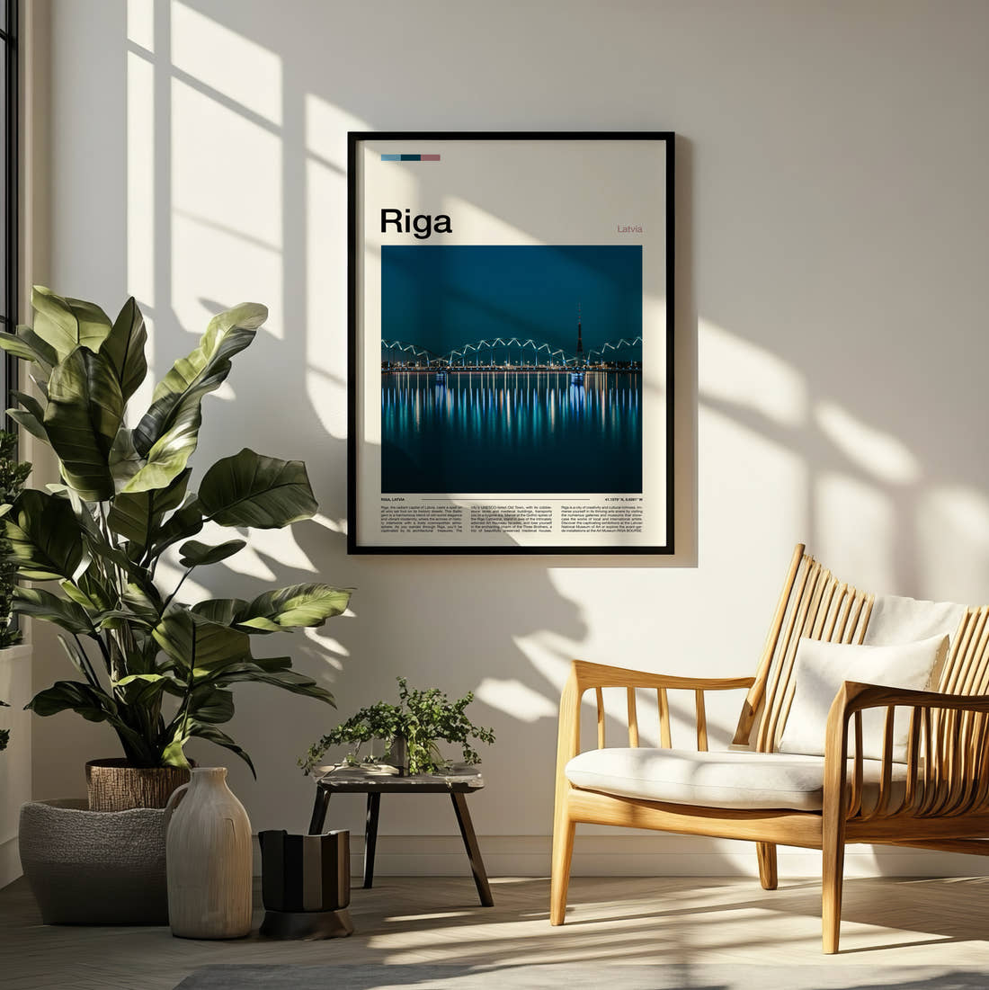 Riga Bridge Lights Reflected Travel Print framed on a pale wall beside houseplants