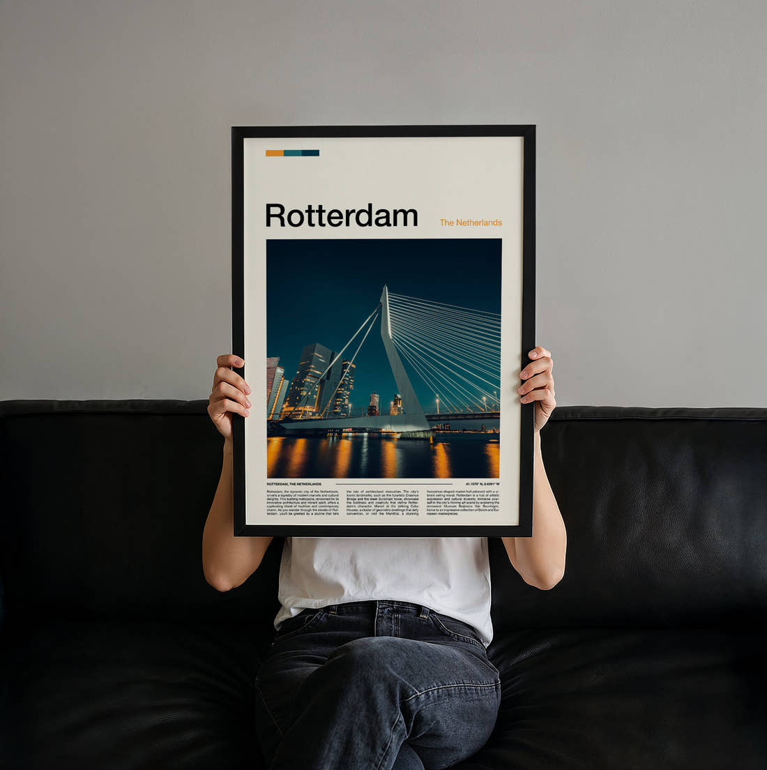 Rotterdam Erasmusbrug At Night Travel Print held up by hand to show the size of the print