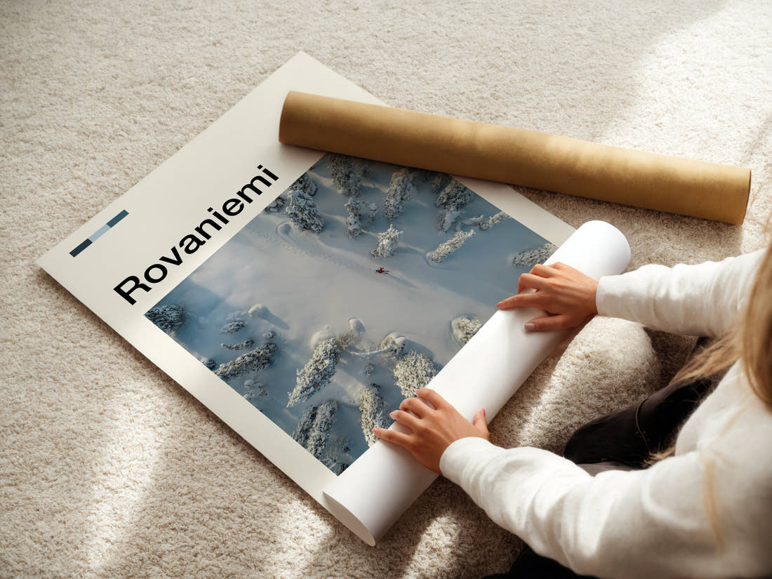 Rovaniemi Aerial Forest Trail Travel Print being unrolled from its postal tube