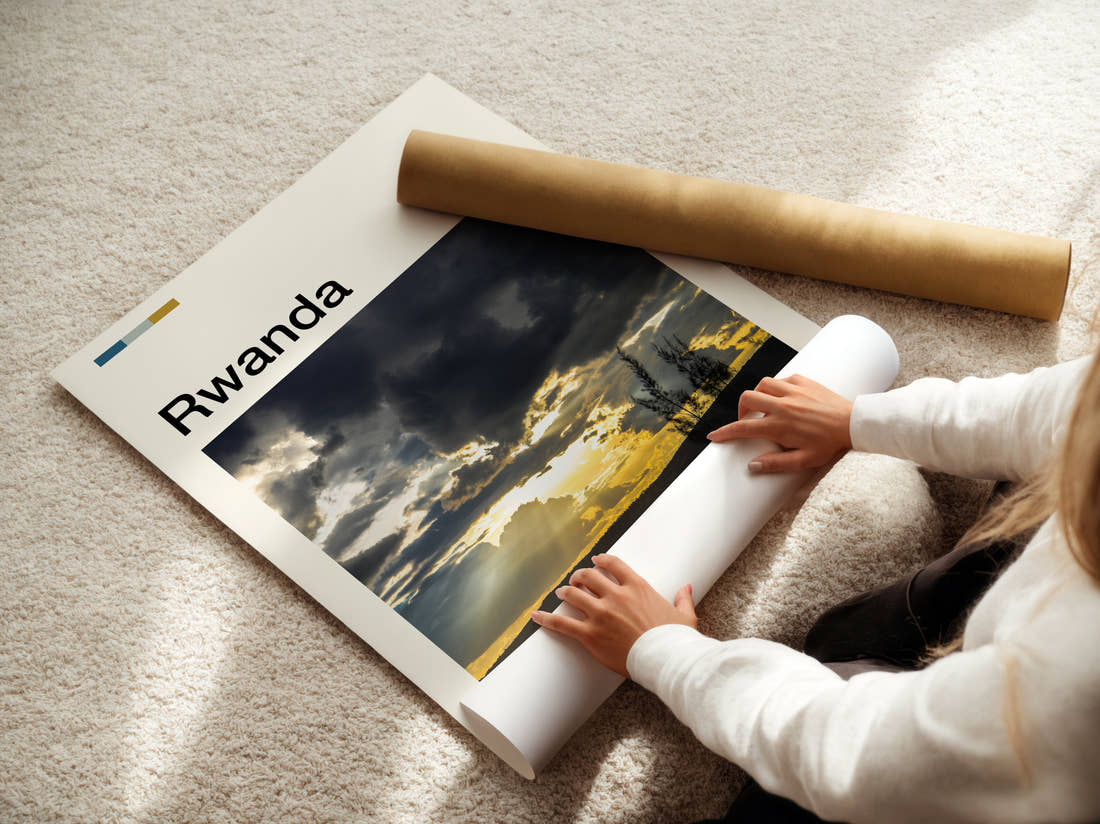 Rwanda Sunbeams Through Clouds Travel Print being unrolled from its postal tube