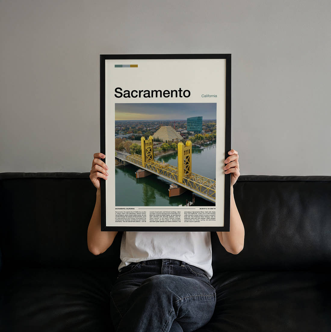 Sacramento Tower Bridge Across The River Travel Print held up by hand to show the size of the print