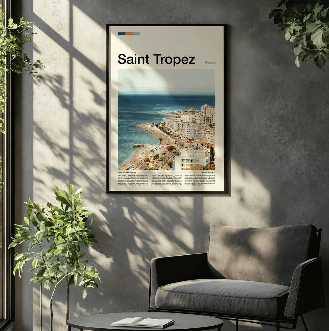 Saint Tropez Aerial Coastal View Travel Print framed on the wall of a relaxed living room