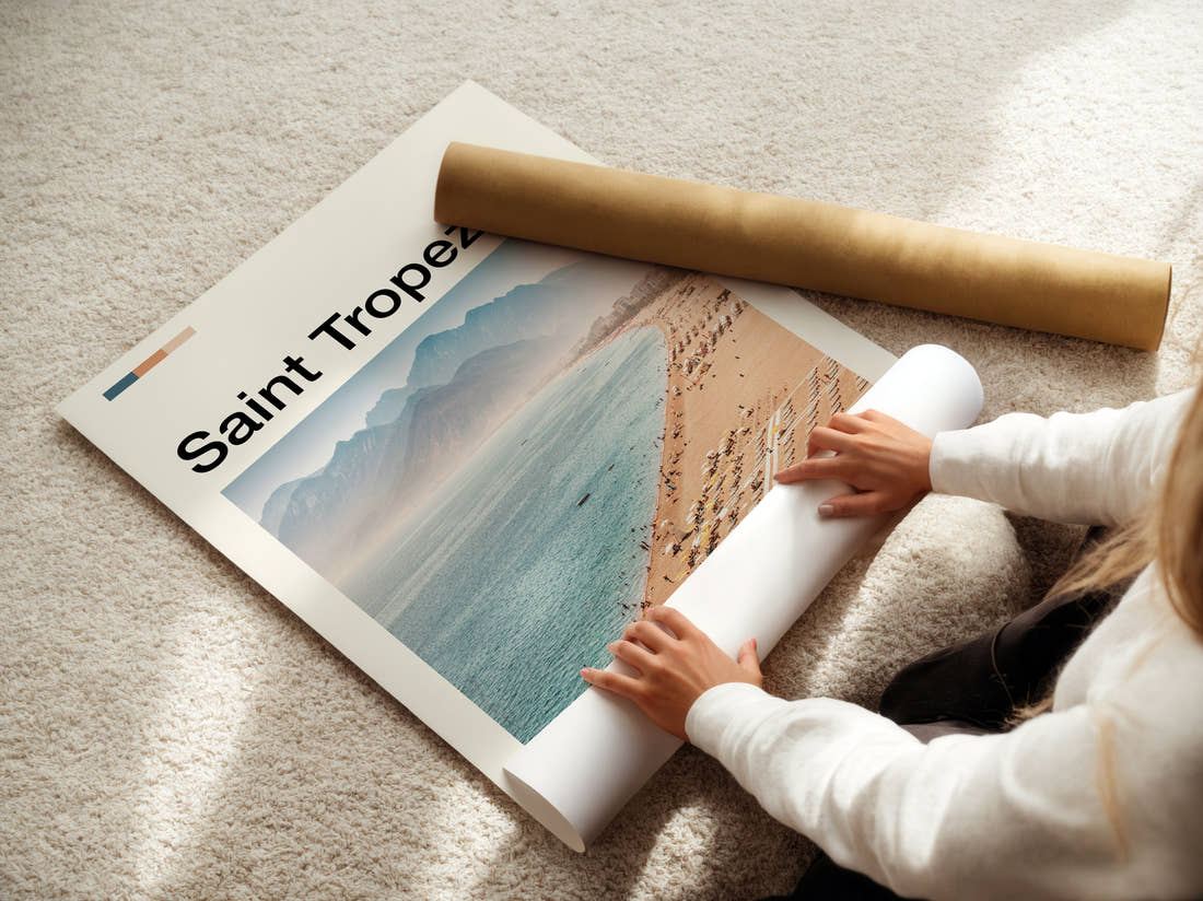 Saint Tropez Beach And Sun Loungers Travel Print being unrolled from its postal tube