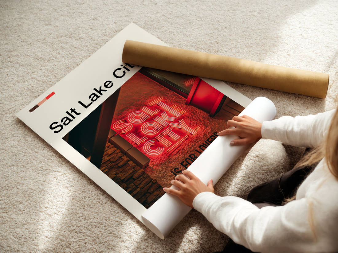 Salt Lake City Neon Sign Travel Print being unrolled from its postal tube