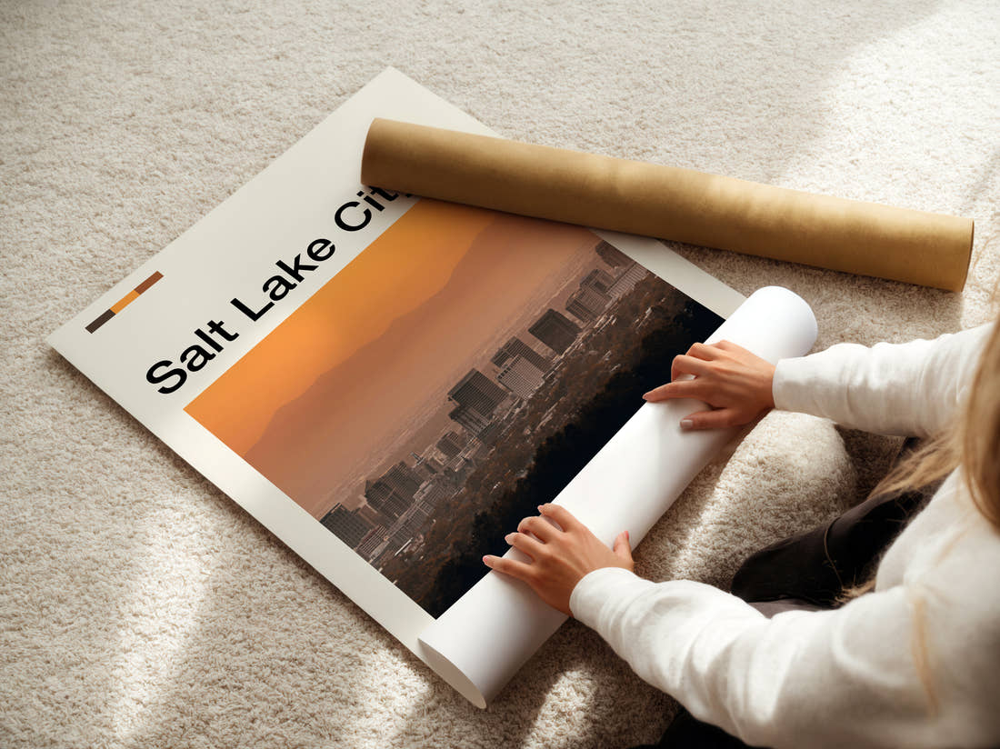 Salt Lake City Hazy Skyline At Sunset Travel Print being unrolled from its postal tube