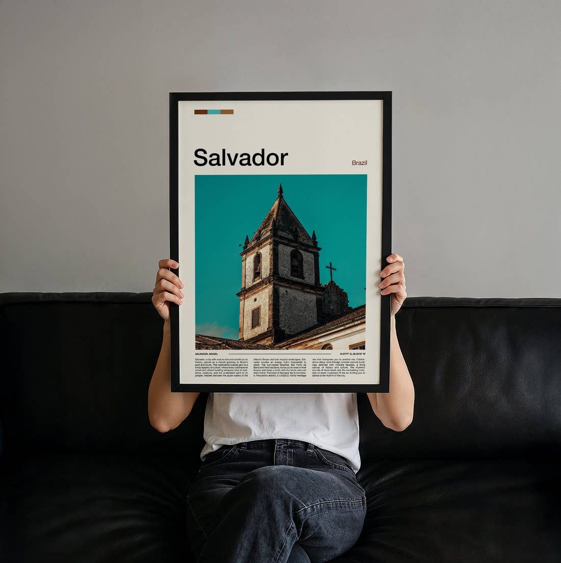 Salvador Church Bell Tower Travel Print held up by hand to show the size of the print