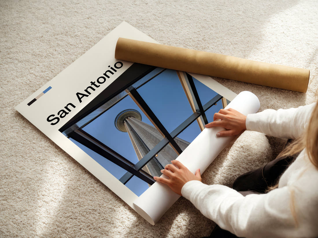 San Antonio Tower Of The Americas Through Glass Travel Print being unrolled from its postal tube