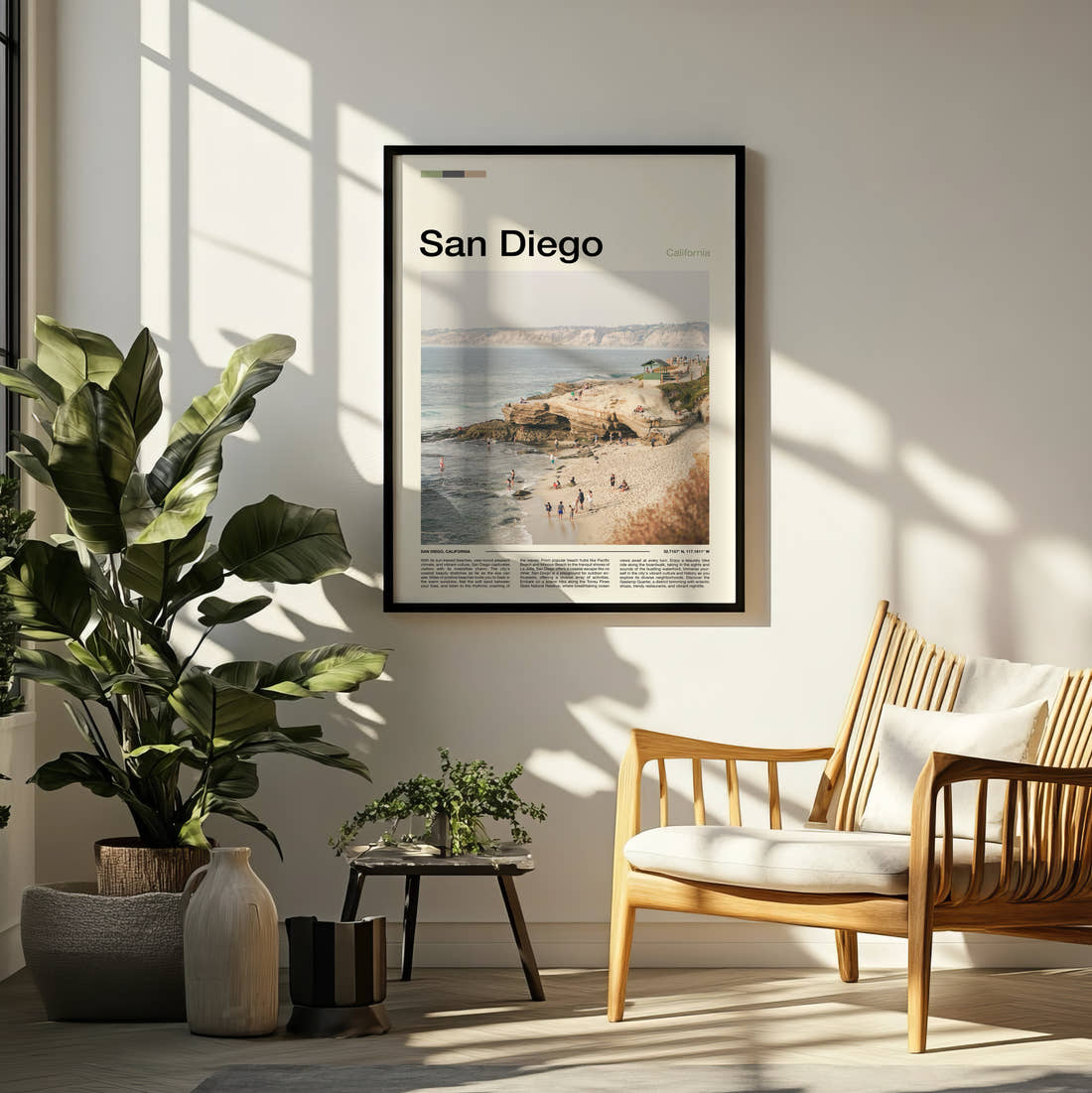 San Diego Beach And Cliffs Travel Print framed on a pale wall beside houseplants