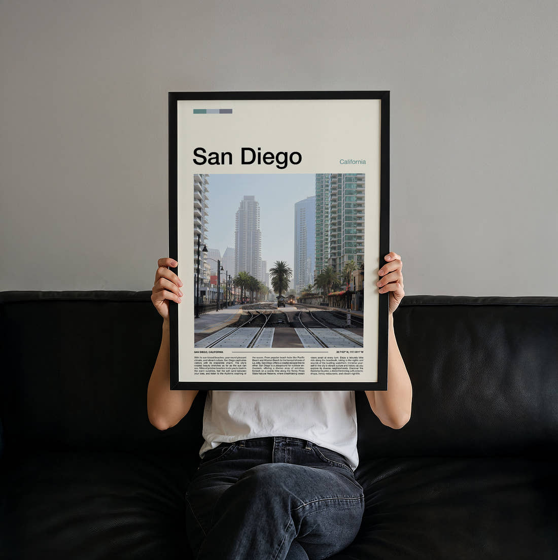San Diego Tram Tracks Travel Print held up by hand to show the size of the print