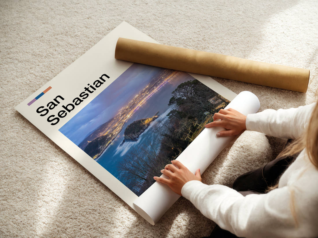 San Sebastian Bay At Dusk Travel Print being unrolled from its postal tube