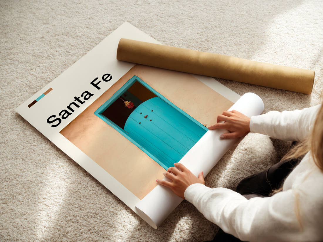 Santa Fe Turquoise Door Travel Print being unrolled from its postal tube