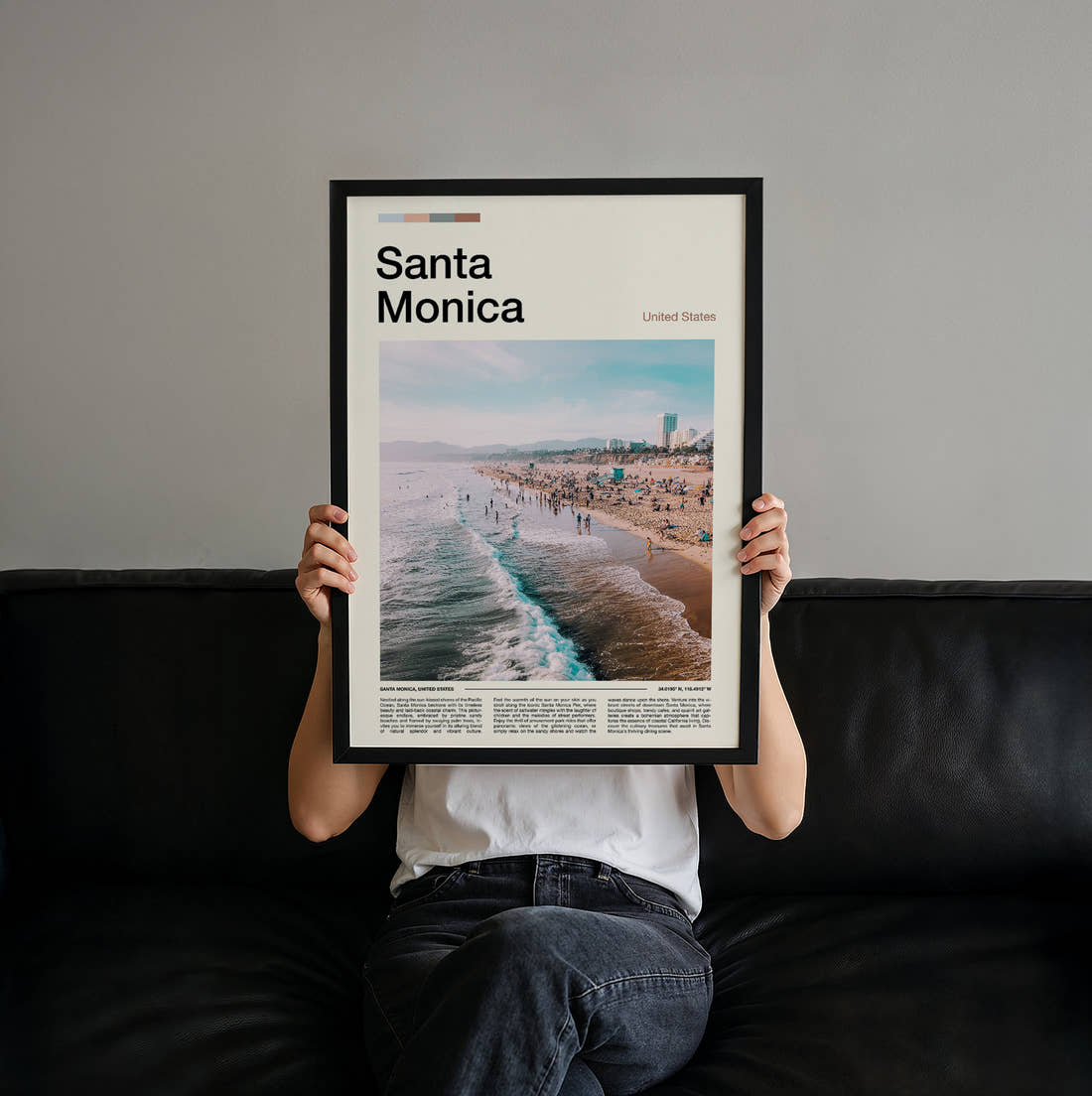 Santa Monica Beach And Waves Travel Print held up by hand to show the size of the print
