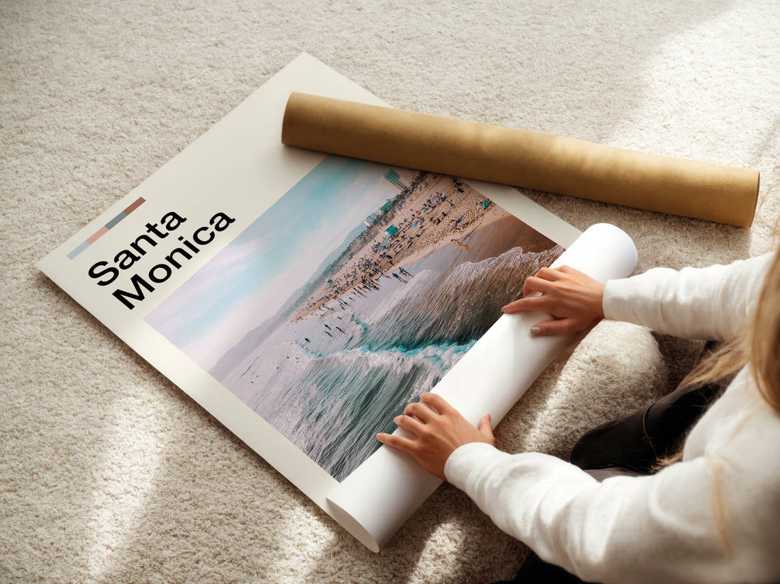 Santa Monica Beach And Waves Travel Print being unrolled from its postal tube
