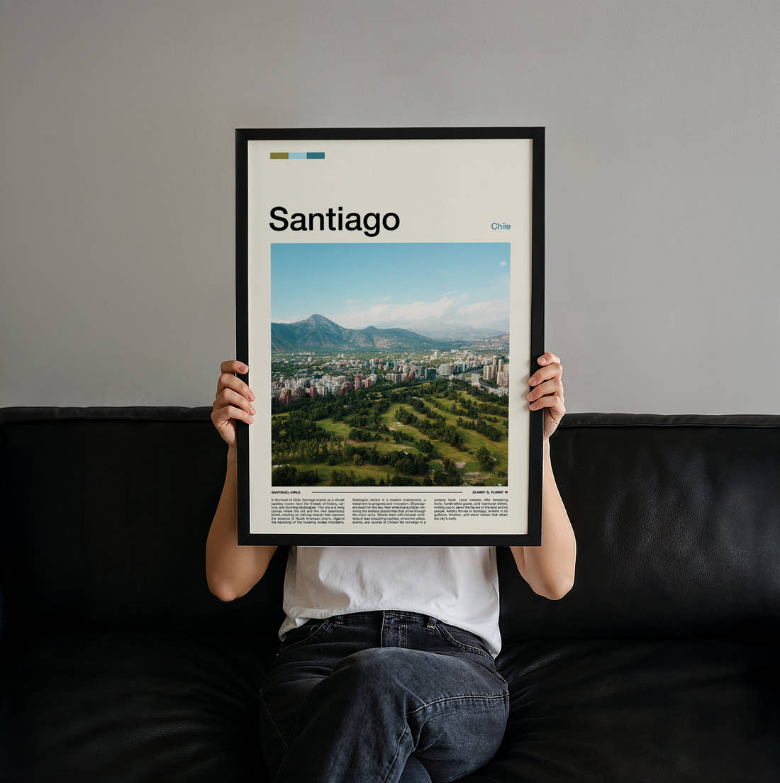 Santiago Parkland And Mountains Travel Print held up by hand to show the size of the print
