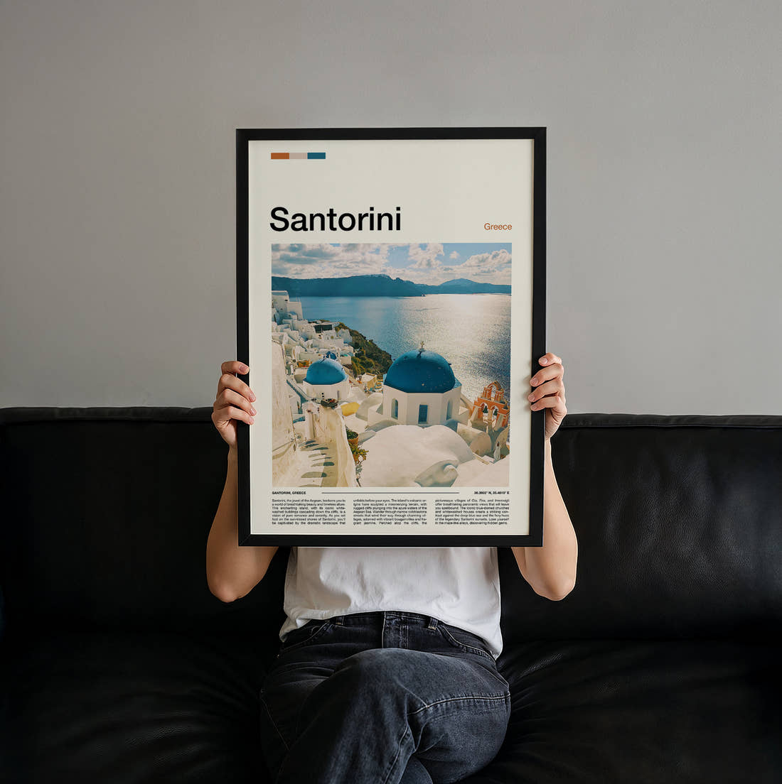 Santorini Blue Domed Churches Travel Print held up by hand to show the size of the print