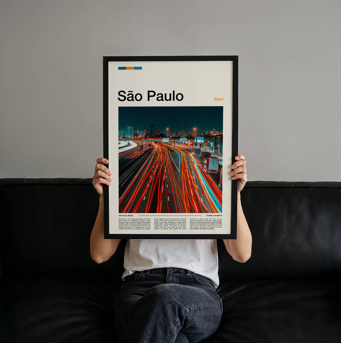 Sao Paulo Traffic Light Trails Travel Print held up by hand to show the size of the print