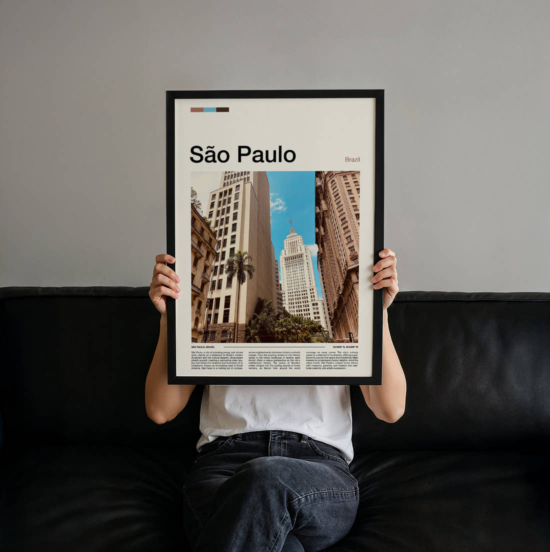 Sao Paulo Skyscrapers From Below Travel Print held up by hand to show the size of the print