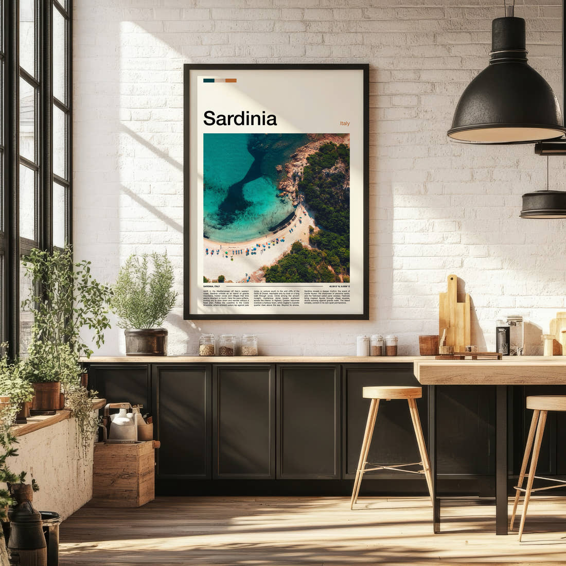 Sardinia Turquoise Cove Aerial Travel Print framed on the wall of a bright kitchen and dining space