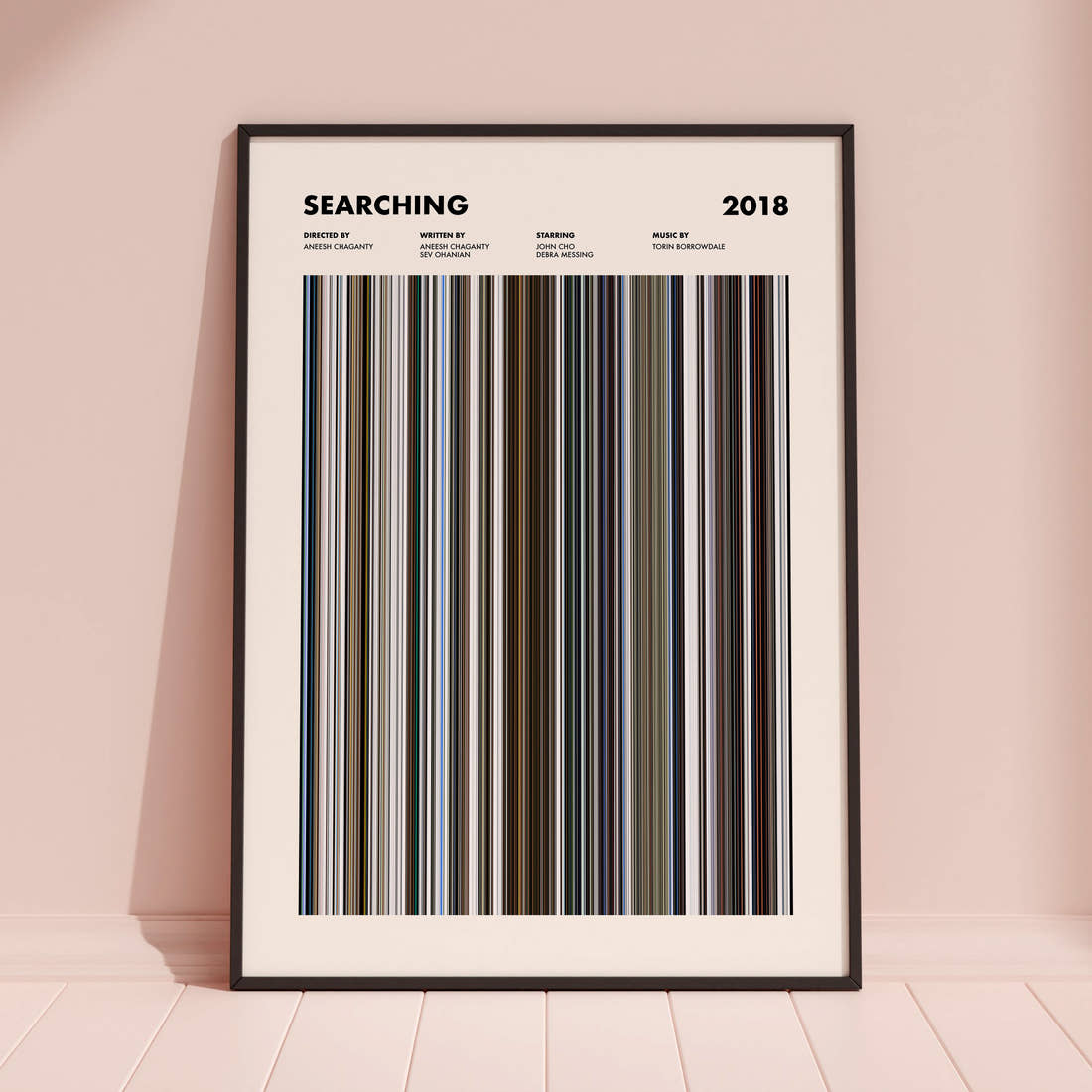 Searching Movie Barcode Poster framed and leaning against a coloured wall