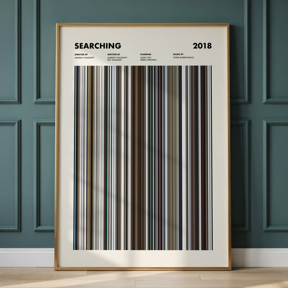 Searching Movie Barcode Poster framed and leaning against a panelled wall