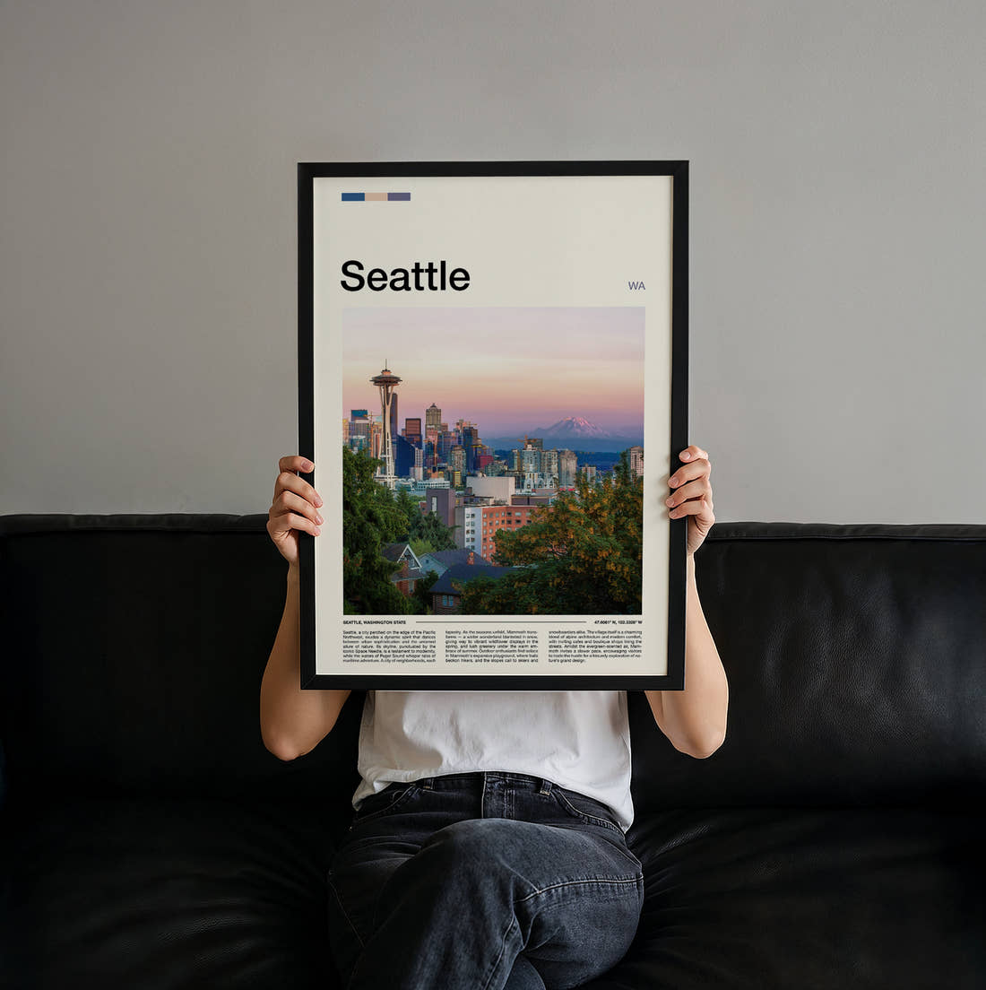 Seattle Space Needle Above The Skyline Travel Print held up by hand to show the size of the print