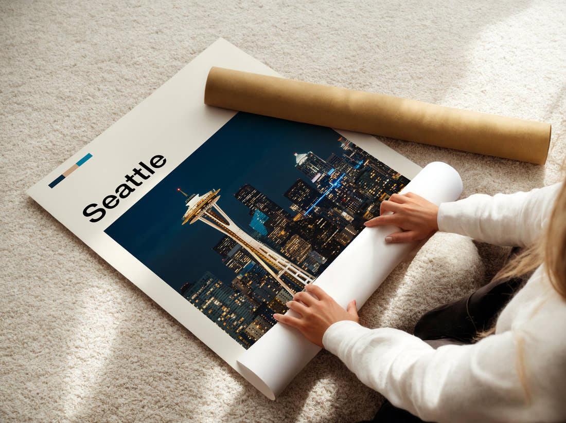 Seattle Space Needle At Night Travel Print being unrolled from its postal tube