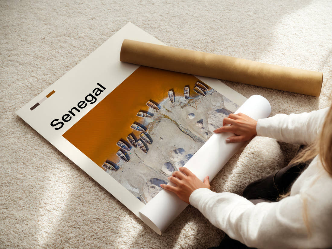 Senegal Aerial Fishing Boats Travel Print being unrolled from its postal tube