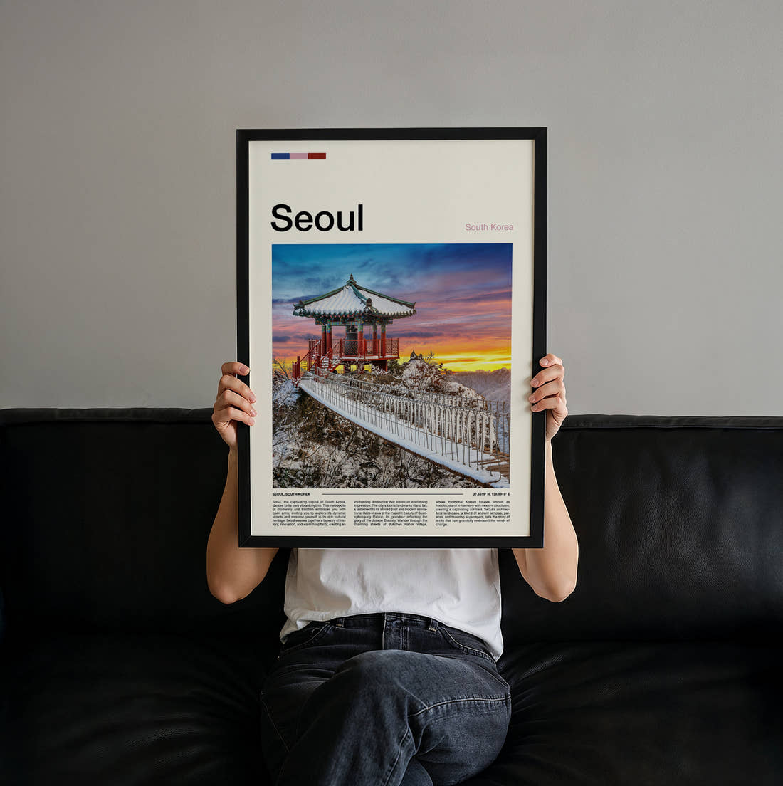 Seoul Traditional Pavilion In Snow Travel Print held up by hand to show the size of the print
