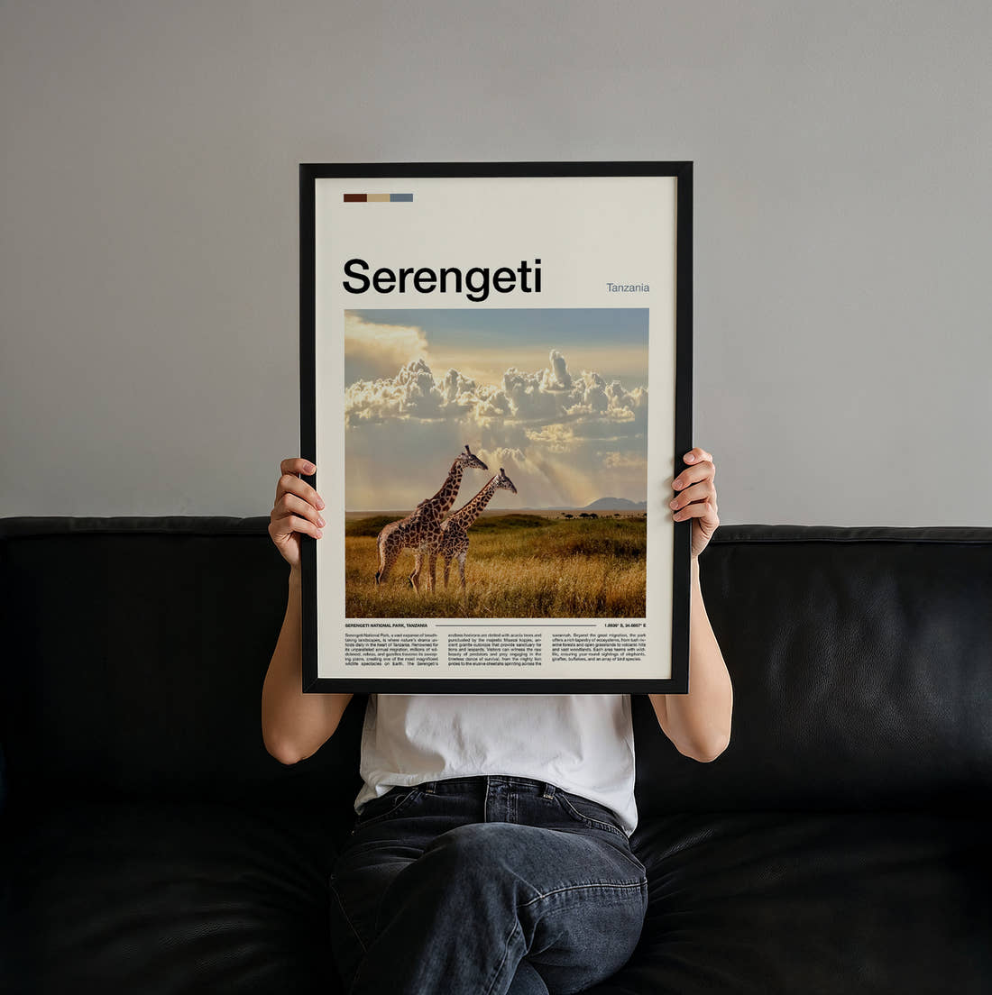 Serengeti Giraffe On The Plains Travel Print held up by hand to show the size of the print