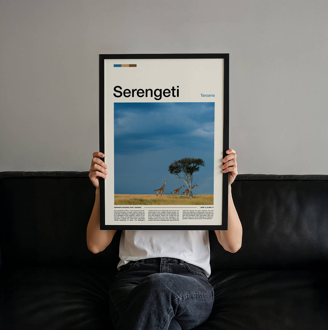 Serengeti Giraffes And Acacia Tree Travel Print held up by hand to show the size of the print