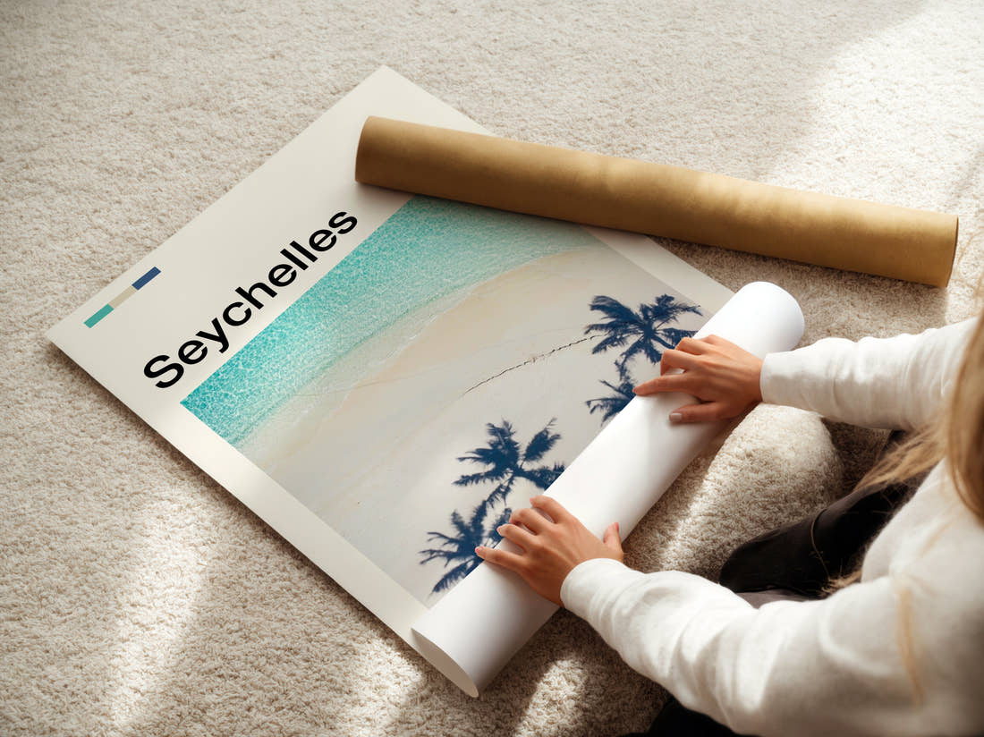 Seychelles Palms And Turquoise Sea Travel Print being unrolled from its postal tube