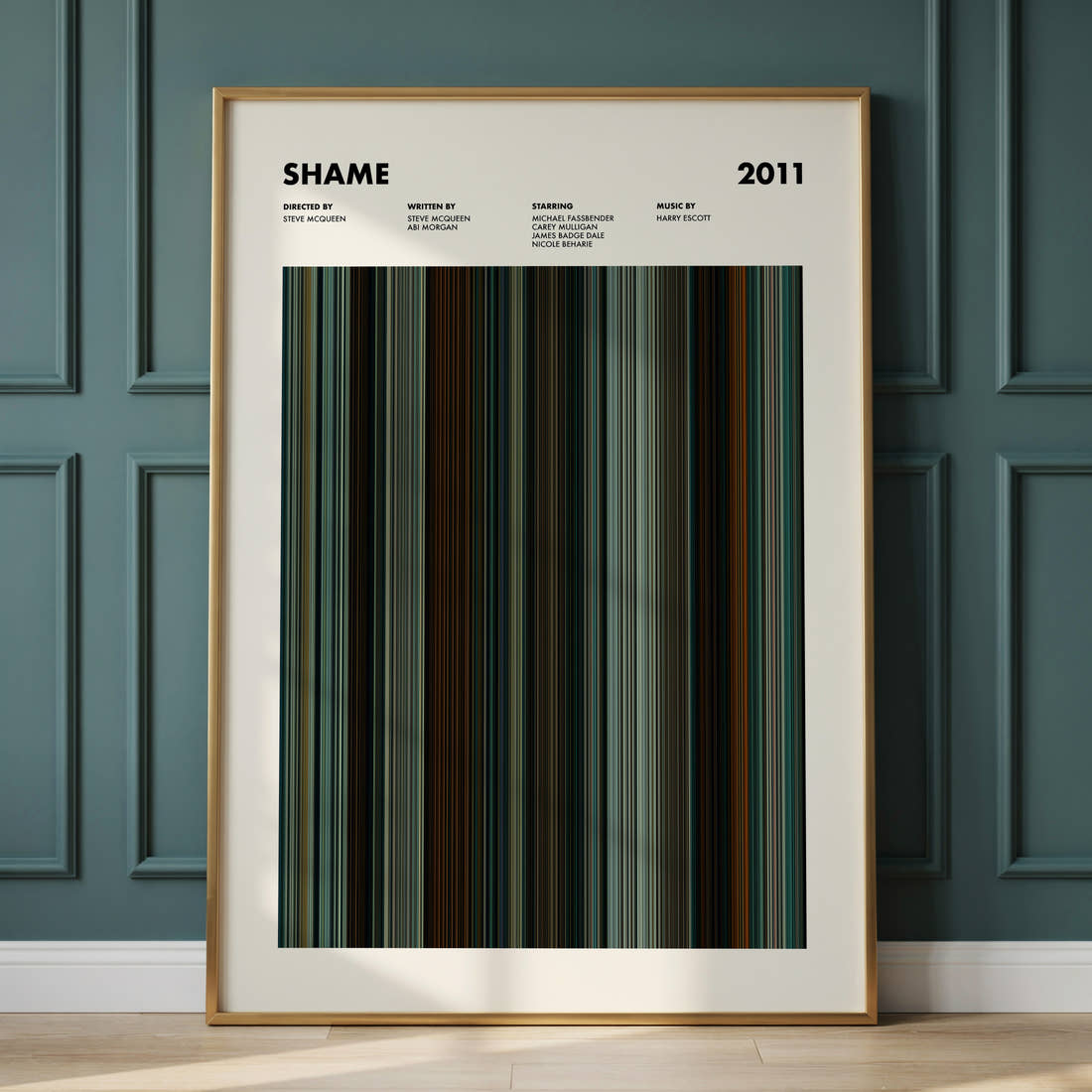 Shame Movie Barcode Poster framed and leaning against a panelled wall