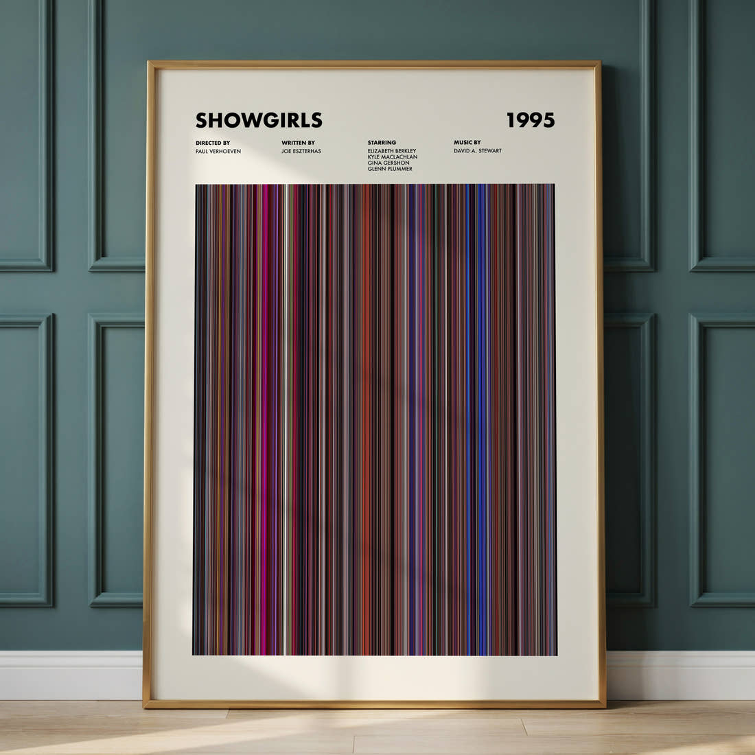 Showgirls Movie Barcode Poster framed and leaning against a panelled wall