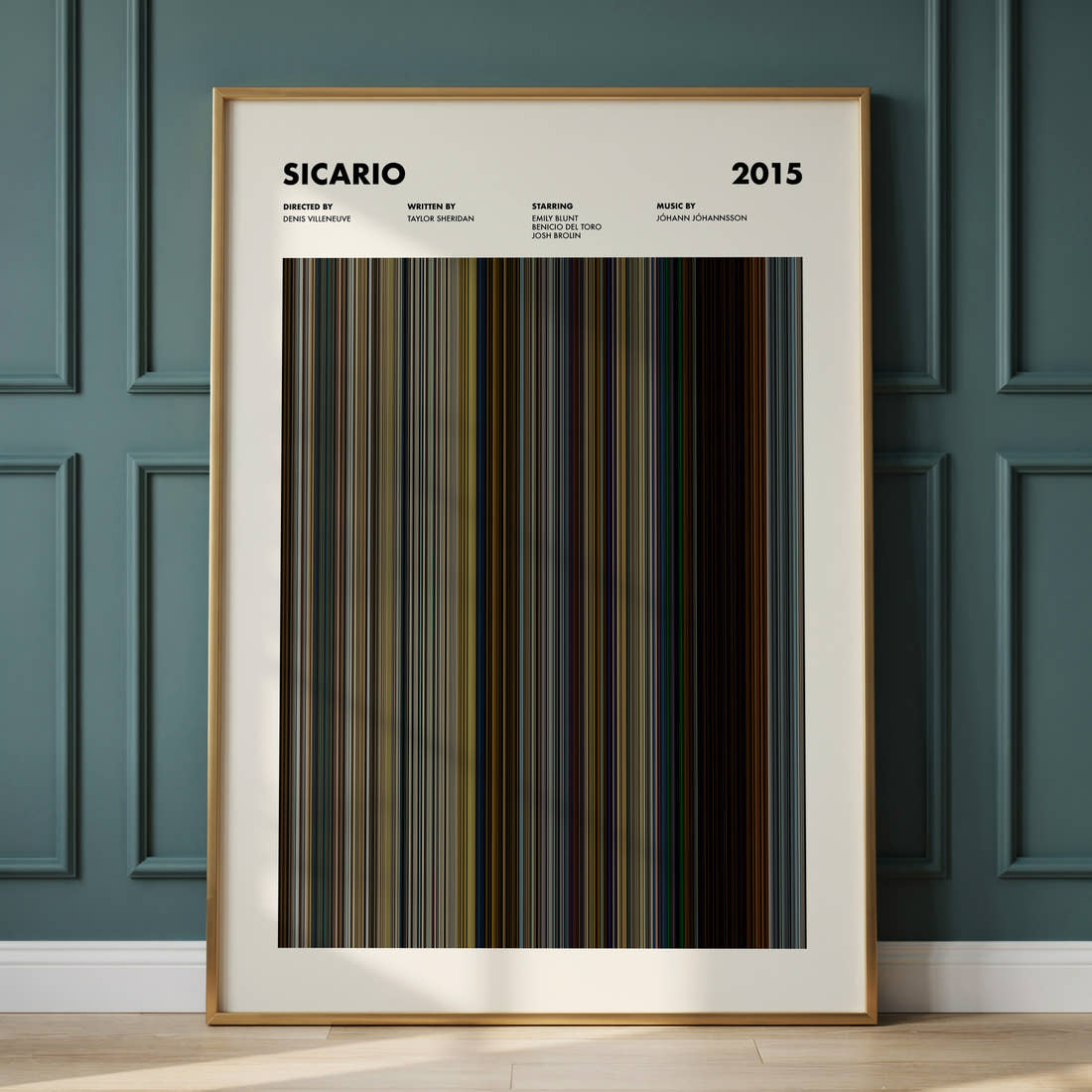 Sicario Movie Barcode Poster framed and leaning against a panelled wall