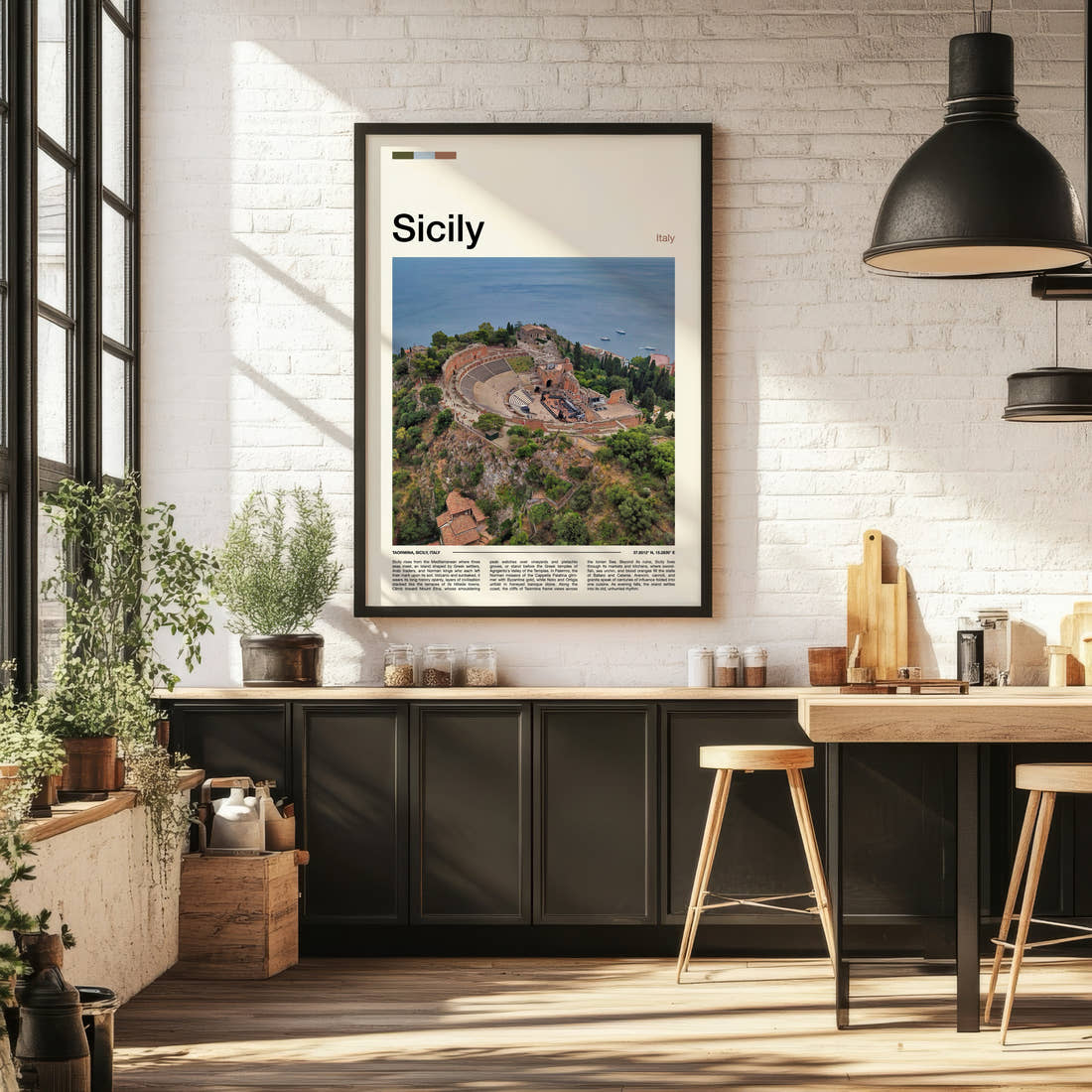 Sicily Ancient Theatre Aerial Travel Print framed on the wall of a bright kitchen and dining space