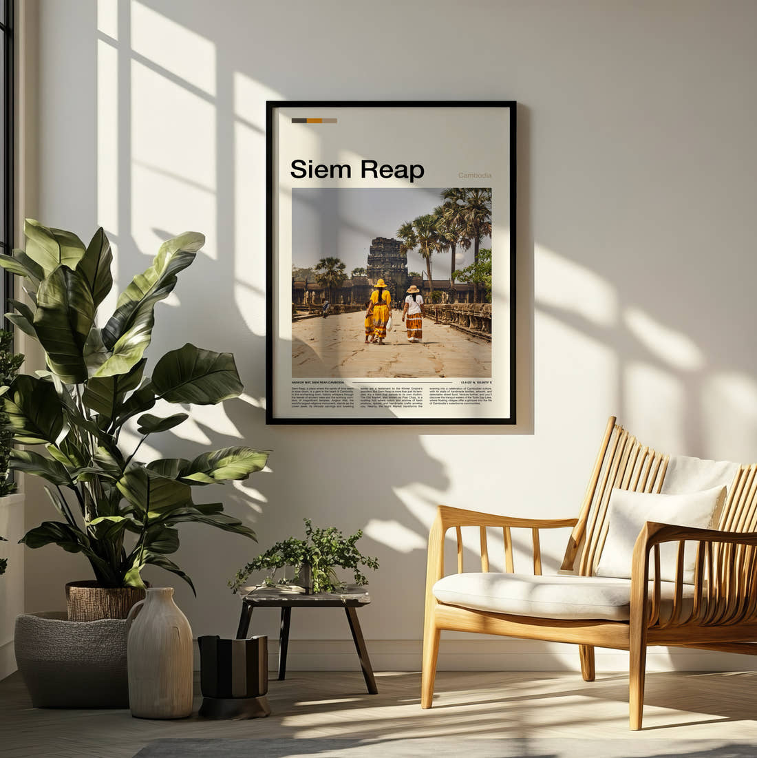 Siem Reap Temple Causeway Travel Print framed on a pale wall beside houseplants