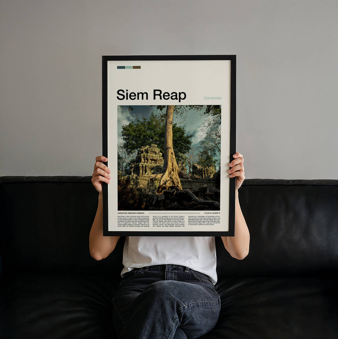 Siem Reap Tree Roots Over Ruins Travel Print held up by hand to show the size of the print