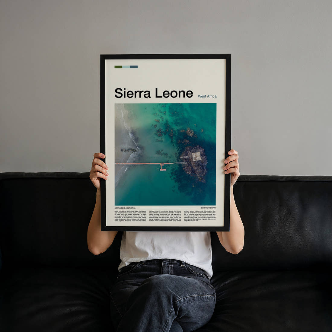 Sierra Leone Aerial Jetty View Travel Print held up by hand to show the size of the print