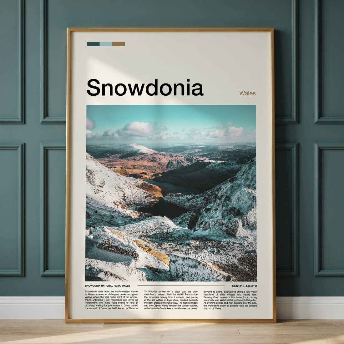 Snowdonia Snow-Capped Ridge Valley Travel Print framed on the wall of a calm, neutral bedroom