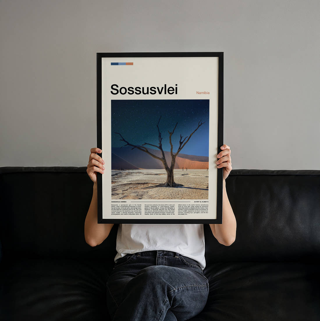 Sossusvlei Dead Tree In Desert Travel Print held up by hand to show the size of the print