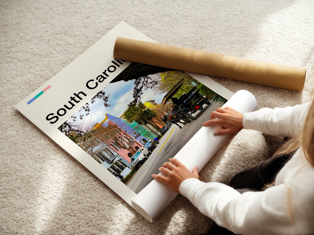 South Carolina Rainbow Row Travel Print being unrolled from its postal tube