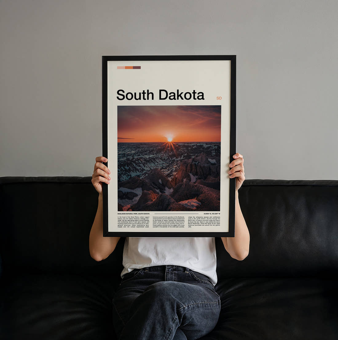 South Dakota Badlands Sunburst At Sunset Travel Print held up by hand to show the size of the print