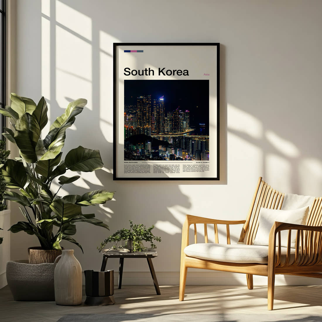 South Korea Night Skyline Over The Harbour Travel Print framed on a pale wall beside houseplants