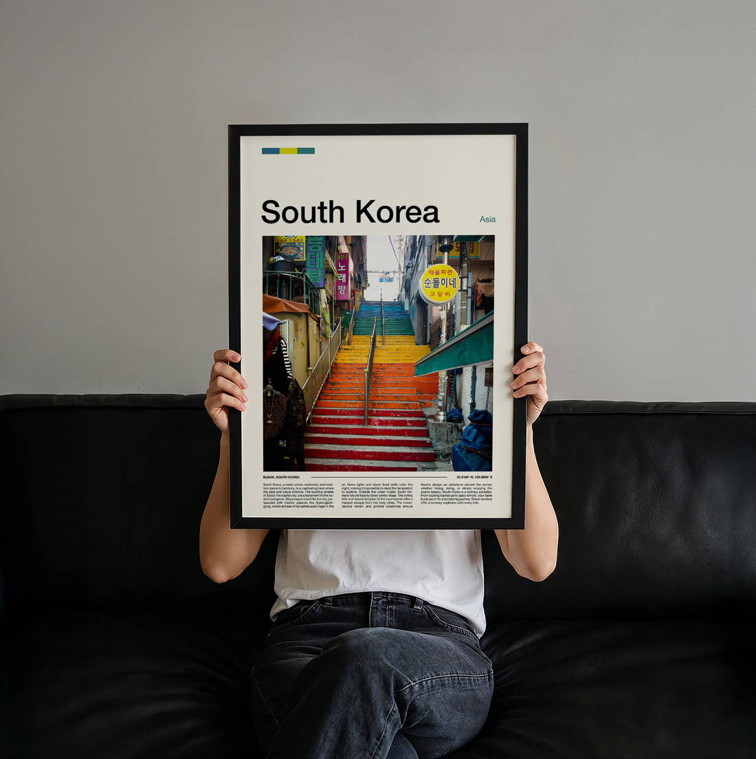 South Korea Colourful Painted Steps Travel Print held up by hand to show the size of the print
