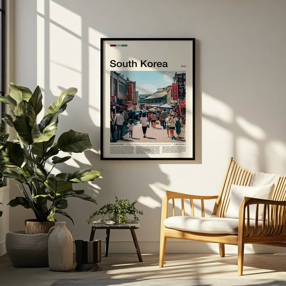 South Korea Busy Shopping Street Travel Print framed on a pale wall beside houseplants